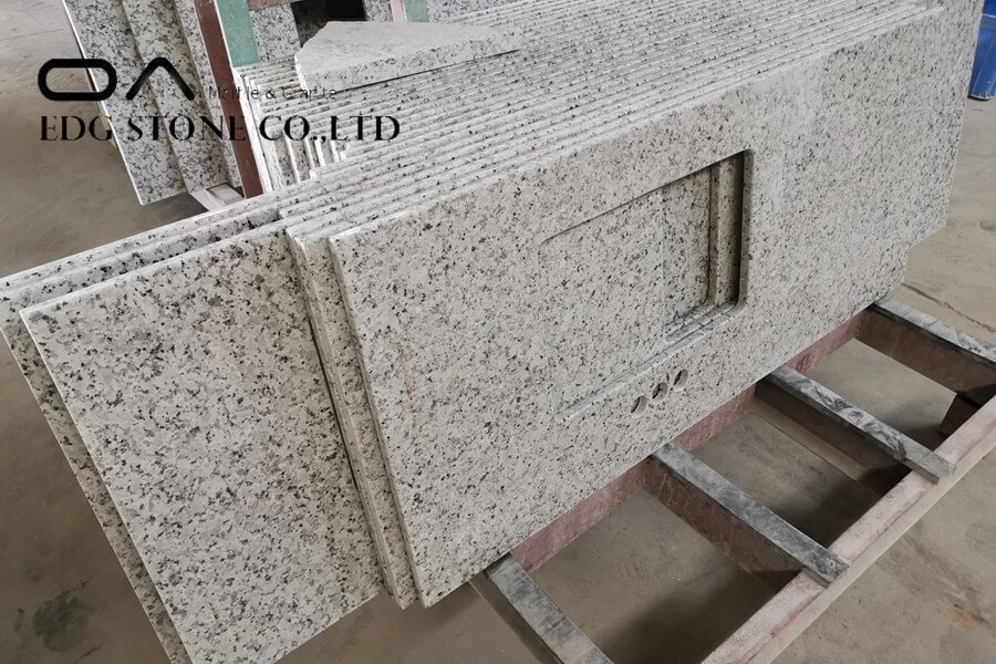 granite countertop cost per sq ft